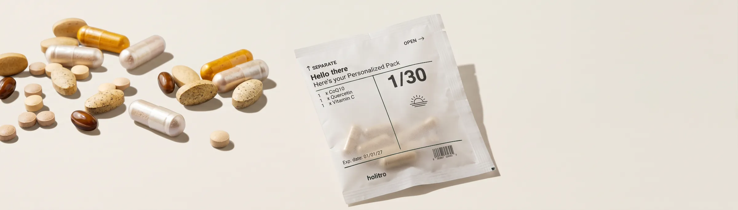 Holitro daily supplement pouch beside capsules and tablets